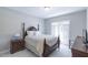 Guest bedroom with double bed and plenty of natural light at 512 W Franklin St, Zebulon, NC 27597