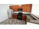 Modern kitchen with stainless steel appliances at 1121 Consortium Dr # 110, Raleigh, NC 27603