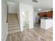 Living room, stairs, and half bathroom at 1121 Consortium Dr # 110, Raleigh, NC 27603