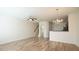 Living room with hardwood floors and stairs at 1121 Consortium Dr # 110, Raleigh, NC 27603
