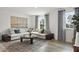 Cozy Gathering room with sectional sofa and large windows at 3158 Alden Way, Angier, NC 27501