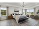 Main bedroom with large windows and sitting area at 3158 Alden Way, Angier, NC 27501
