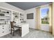 Home office with built-in shelves and a desk at 3158 Alden Way, Angier, NC 27501