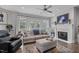 Living room featuring a fireplace and hardwood floors at 409 Rogers Rd, Zebulon, NC 27597