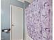 Clean bathroom with shower and floral shower curtain at 205 Shelby Ln, Siler City, NC 27344