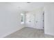 Bright bedroom with window, closet and carpet flooring at 3010 Garner Rd # 101, Raleigh, NC 27610