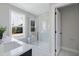 Bathroom with a large walk-in shower and marble tile at 3010 Garner Rd # 101, Raleigh, NC 27610