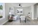 Living room with gray sofa, coffee table, and area rug at 3010 Garner Rd # 101, Raleigh, NC 27610