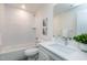 Simple bathroom with white tile, bathtub, and a single vanity at 3010 Garner Rd # 101, Raleigh, NC 27610