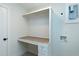 Functional laundry room with built-in storage and folding counter at 3010 Garner Rd # 101, Raleigh, NC 27610