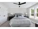 Comfortable bedroom with ceiling fan, and plenty of natural light at 3010 Garner Rd # 101, Raleigh, NC 27610