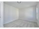 Simple bedroom with carpet flooring and a window at 3010 Garner Rd # 101, Raleigh, NC 27610