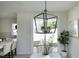Dining area with a chandelier, and access to backyard at 3010 Garner Rd # 101, Raleigh, NC 27610