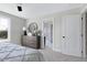 Bright bedroom with a dresser, and access to a full bathroom at 3010 Garner Rd # 101, Raleigh, NC 27610