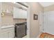 Laundry room with washer, dryer, cabinets and sink at 2000 Silverleaf Dr, Youngsville, NC 27596