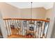 Overlooking living room with fireplace and built-in shelving at 2000 Silverleaf Dr, Youngsville, NC 27596