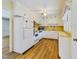 Kitchen with white cabinets and appliances at 414 Ward St, Graham, NC 27253