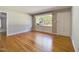 Living room with hardwood floors and neutral-toned walls at 414 Ward St, Graham, NC 27253