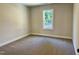 Spacious bedroom with neutral walls and carpeting at 6965 Us-401, Fuquay Varina, NC 27526