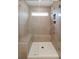 Large walk-in shower with built-in seat and glass enclosure at 2105 Seneca Dr # 34, Raleigh, NC 27604