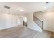 Bright bonus room featuring hardwood floors and built-in shelving at 2105 Seneca Dr # 34, Raleigh, NC 27604
