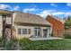 Rear exterior of home with patio and fenced yard at 3721 Old Post Rd, Raleigh, NC 27612