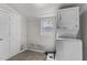 Laundry room with stackable washer and dryer at 810 E Edenton St, Raleigh, NC 27601