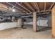 Unfinished basement with exposed brick and pipes at 810 E Edenton St, Raleigh, NC 27601