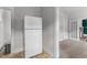 Kitchen features a white refrigerator and access to the basement at 810 E Edenton St, Raleigh, NC 27601