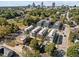 Aerial view of townhouses with city skyline in background at 810 E Edenton St, Raleigh, NC 27601