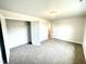 Cozy bedroom with carpeted floor and double door closet at 333 Hopewell Branch Ct, Smithfield, NC 27577
