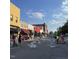 People enjoying a putt-putt course in a town square at 333 Hopewell Branch Ct, Smithfield, NC 27577