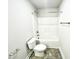 Simple bathroom with a shower/tub combo and tile floor at 333 Hopewell Branch Ct, Smithfield, NC 27577