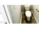 Small powder room with toilet and pedestal sink at 333 Hopewell Branch Ct, Smithfield, NC 27577