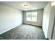 Bright bedroom with carpeted floors and window at 333 Hopewell Branch Ct, Smithfield, NC 27577