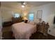 Main bedroom with a queen-size bed and ensuite bathroom access at 283 Pump Station Rd, Erwin, NC 28339