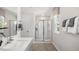 Elegant bathroom featuring a large shower and double vanity at 385 Swift Creek Farm Ln, Clayton, NC 27520