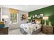 bedroom with dinosaur theme and twin bed at 385 Swift Creek Farm Ln, Clayton, NC 27520