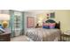 Cozy bedroom with a full-size bed and colorful decor at 385 Swift Creek Farm Ln, Clayton, NC 27520