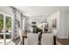 Spacious dining area with hardwood floors and access to a deck at 385 Swift Creek Farm Ln, Clayton, NC 27520