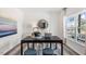 Spacious home office with large window and built-in shelving at 385 Swift Creek Farm Ln, Clayton, NC 27520