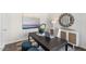 Modern home office with dark wood desk and stylish decor at 385 Swift Creek Farm Ln, Clayton, NC 27520