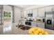 Modern kitchen with granite countertops, stainless steel appliances, and ample cabinet space at 385 Swift Creek Farm Ln, Clayton, NC 27520