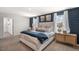 Spacious main bedroom with a king-size bed and ensuite bathroom at 385 Swift Creek Farm Ln, Clayton, NC 27520