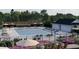 Community pool with lounge chairs and umbrellas at 304 Deercroft Dr, Apex, NC 27539