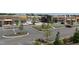 Aerial view of shopping center parking lot and stores at 304 Deercroft Dr, Apex, NC 27539