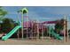 Modern playground with slides, climbing structures, and sand area at 304 Deercroft Dr, Apex, NC 27539