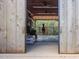 View of a horse in a spacious barn stall at 548 Double N Rd, Pittsboro, NC 27312