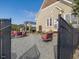 Patio area with fire pit, chairs, and pergola at 548 Double N Rd, Pittsboro, NC 27312