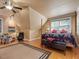 Bright bedroom with king bed, sitting area, and wood floors at 548 Double N Rd, Pittsboro, NC 27312